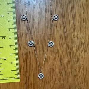 Gold over 925 Piece Sign Necklace with Crystal Accents.